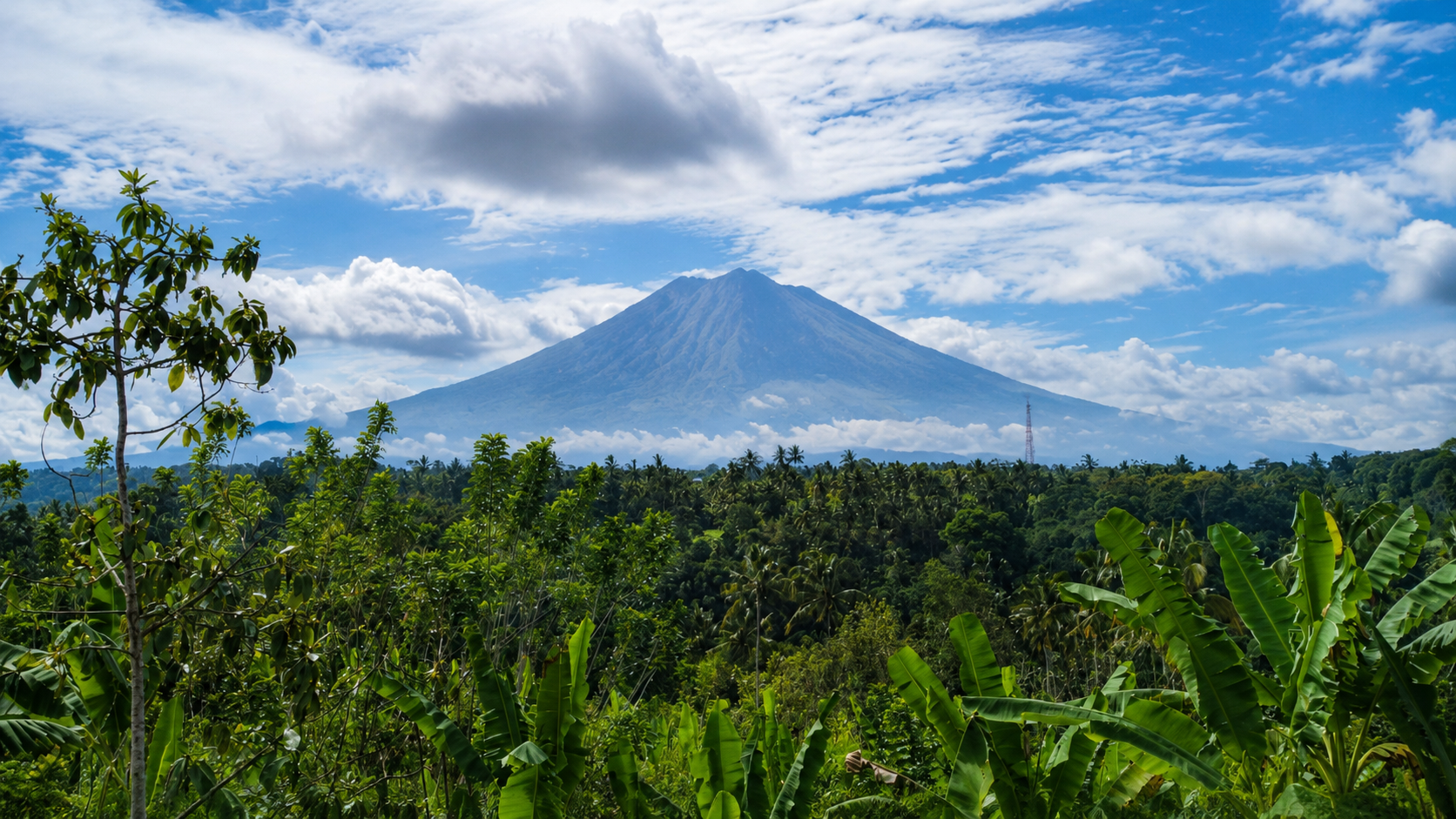 Mount Agung volcano view over lush tropical jungle near Ubud